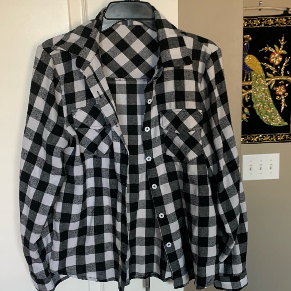 Size small, classic, black, and white checkered flannel.